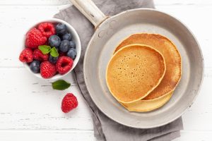 pancakes and bowl of fruit 